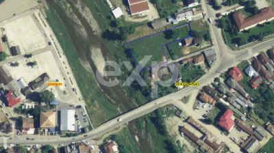 Teren intravilan Domnești, Central lângă Liceu, pe malul Râului